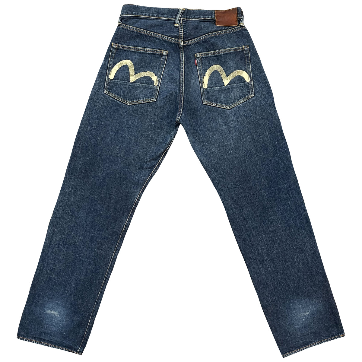Vintage Evisu jeans showing the signature painted gull logos across both back pockets