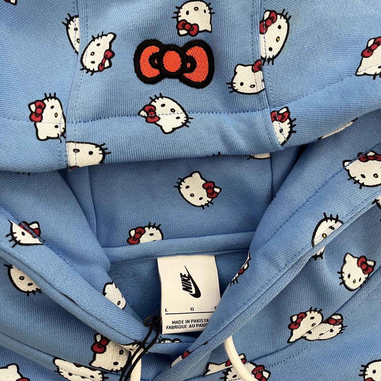Hello kitty nike sweater hotsell
